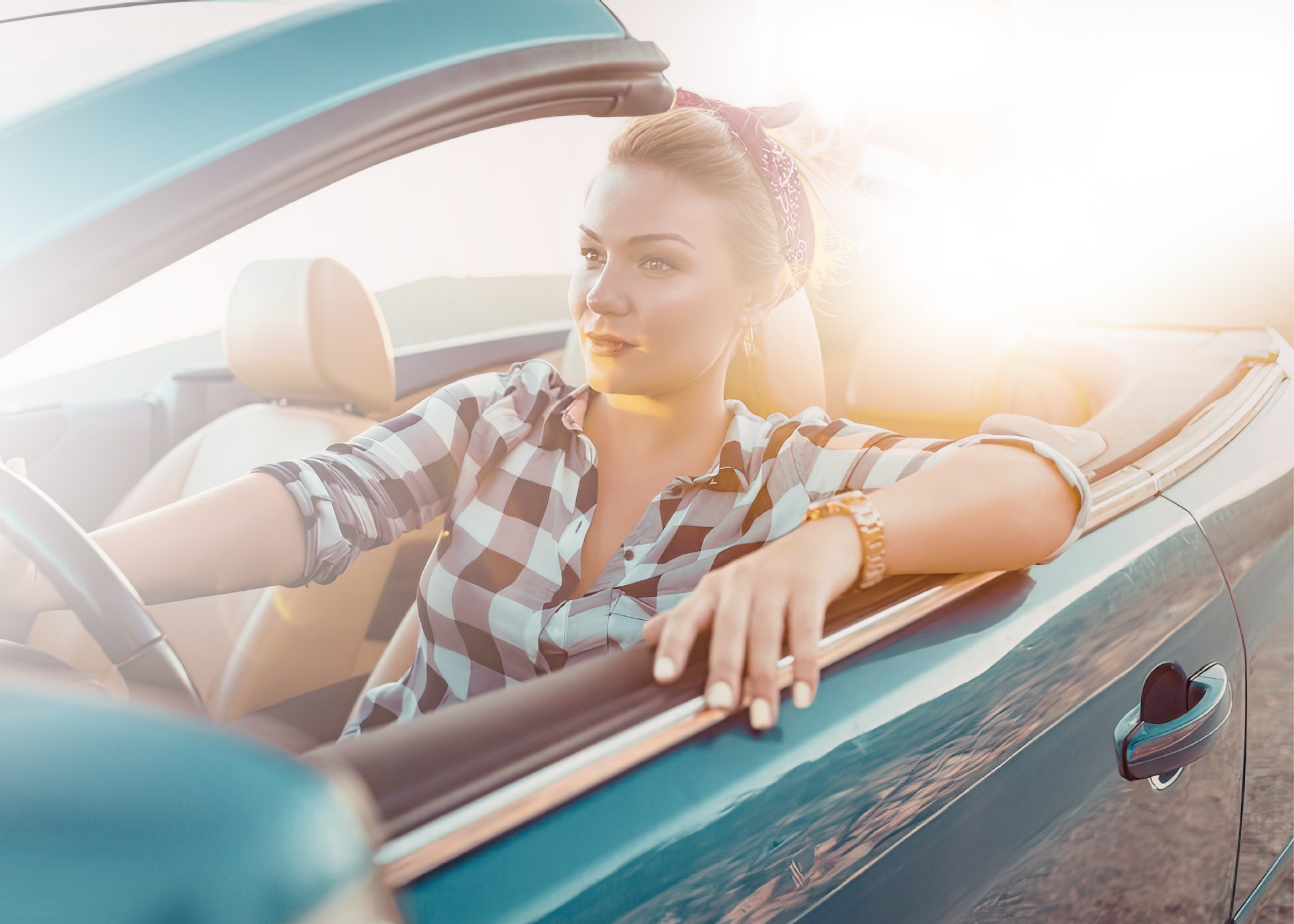 Woman in car using mobile device for parking
